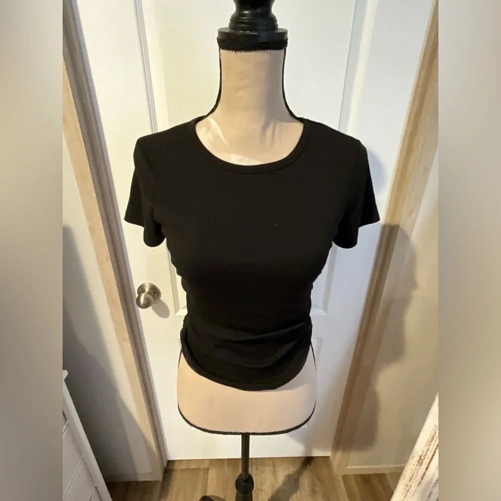 Better Together sz Medium black top with gathering on each side.